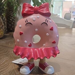 Pink Donut Figurine with Red Bow